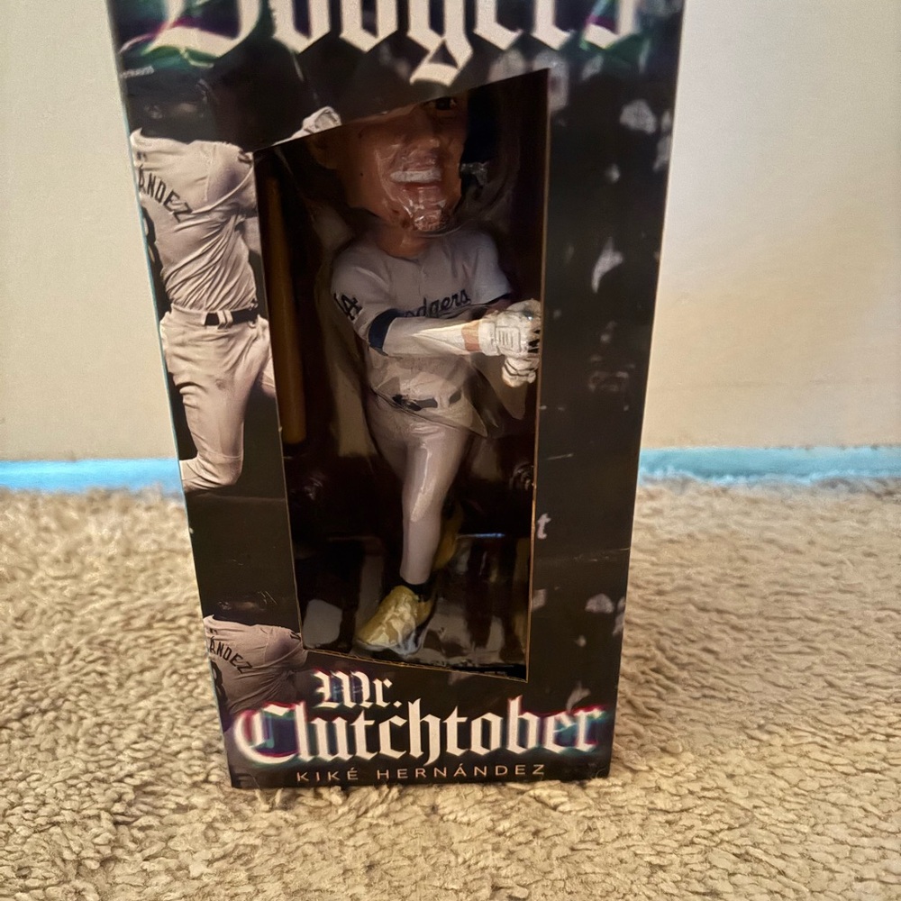Mr. Clutchtober Bobblehead in White Uniform